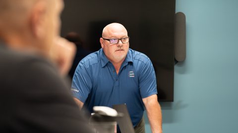 Rmada United coach listening to clients in a lesson